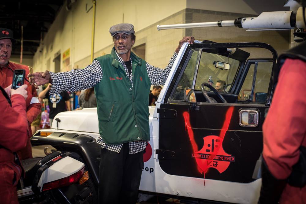 Michael Wright - Elias painting the V on the Laser Jeep - Photo: Dan Galli